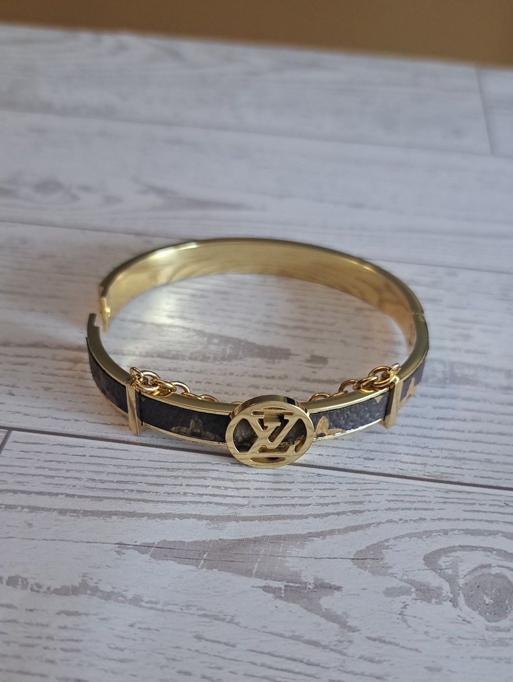Gold-Tone Bracelet with Brown Logo Band